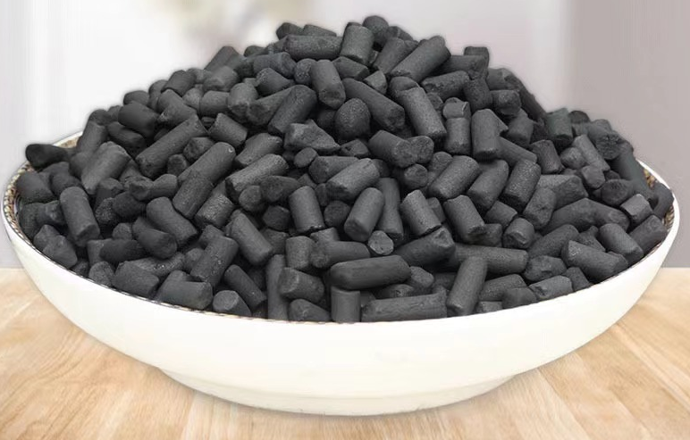 Heap leaching of activated carbon pellets impregnated with sodium hydroxide