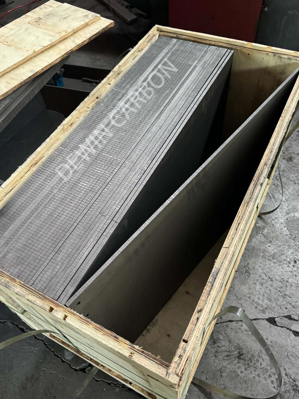 Graphite is commonly used as an anode material in the electrolytic refining of zinc, particularly in processes involving ammonia.