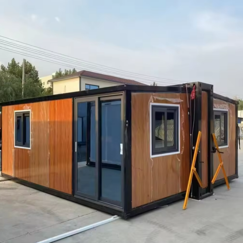 Collapsible and expandable container house