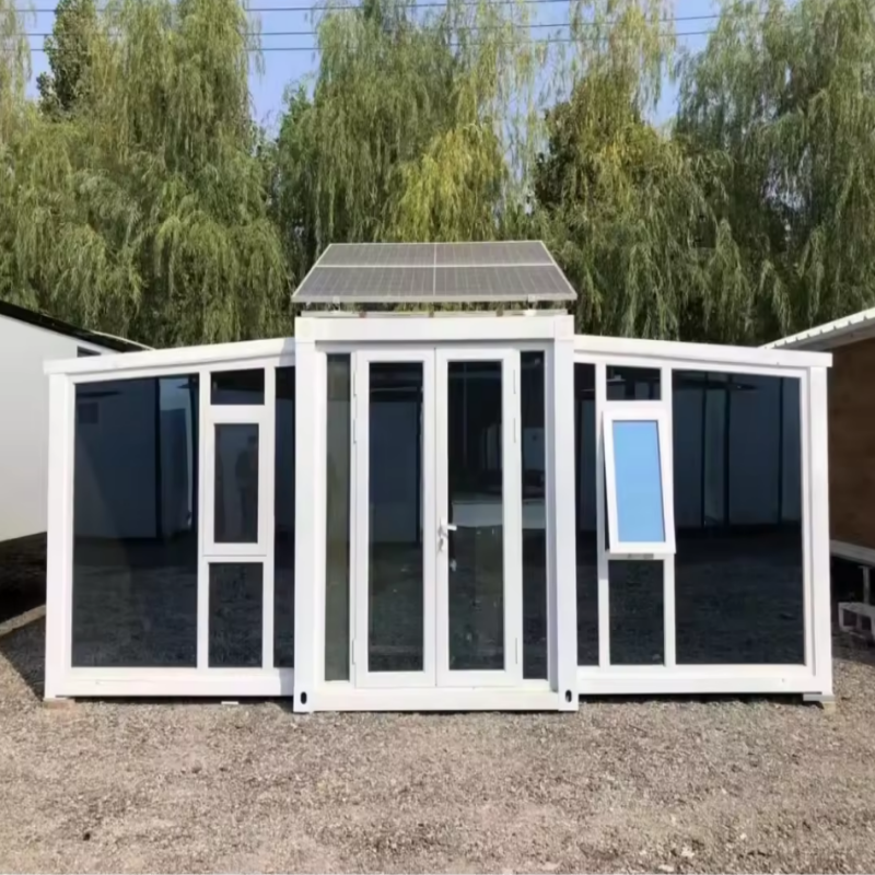 Collapsible and expandable container house