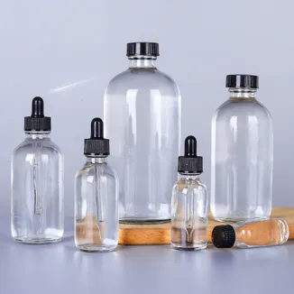 واضح بوسطن زجاجات مستديرة مع الرشاشات