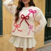 Women's white bow pattern pullover sweater