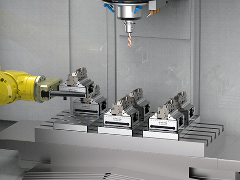 Production Line with Pneumatic Quick-Change Base Plates and Self-Centering Vises