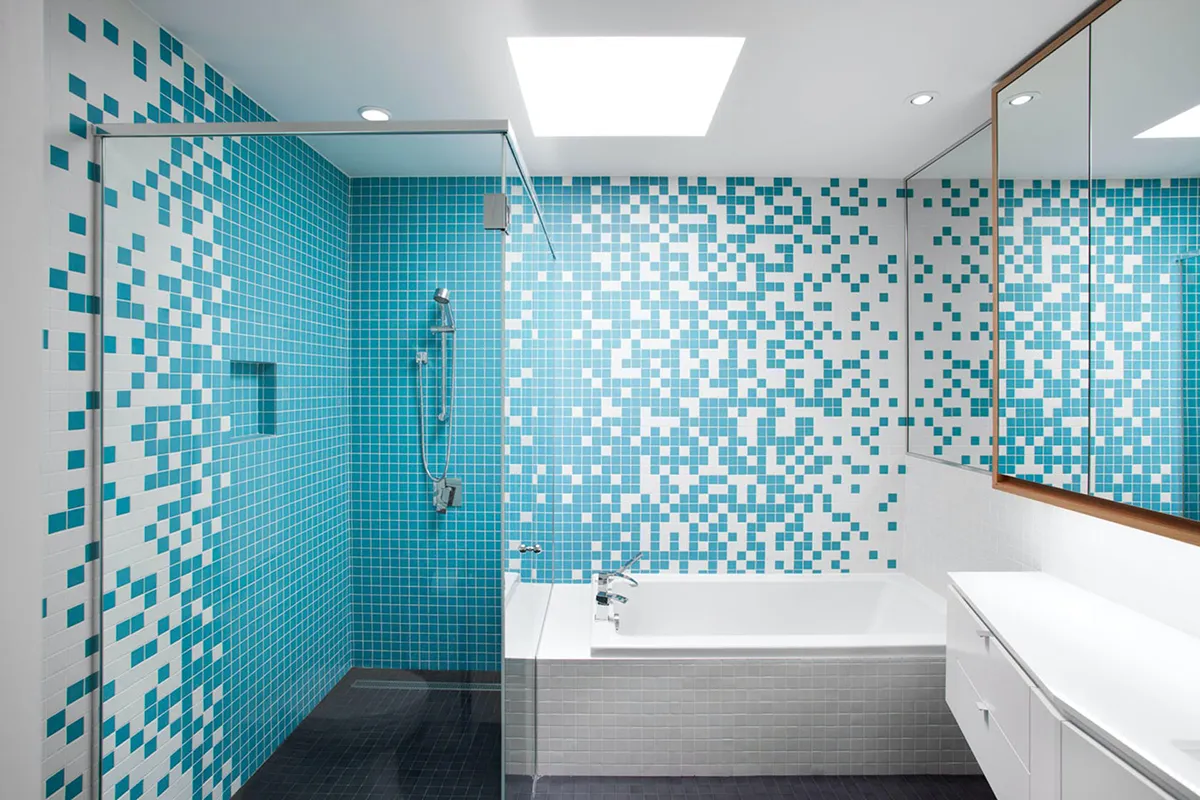 Why do many toilets use mosaic tiles?