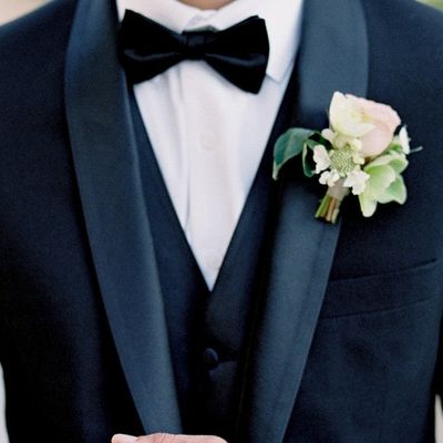 The black bow tie is a classic accessory for wedding occasions-[Handsome tie]
