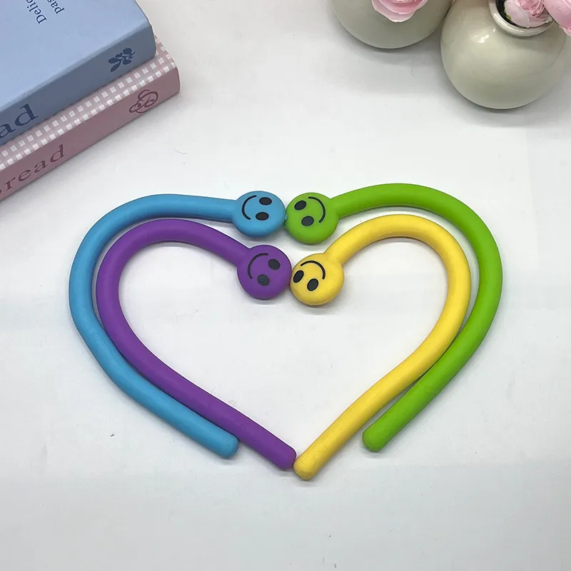 TPR stretch- en buig-stress-verlichting smiley-speeltje met lange stok 