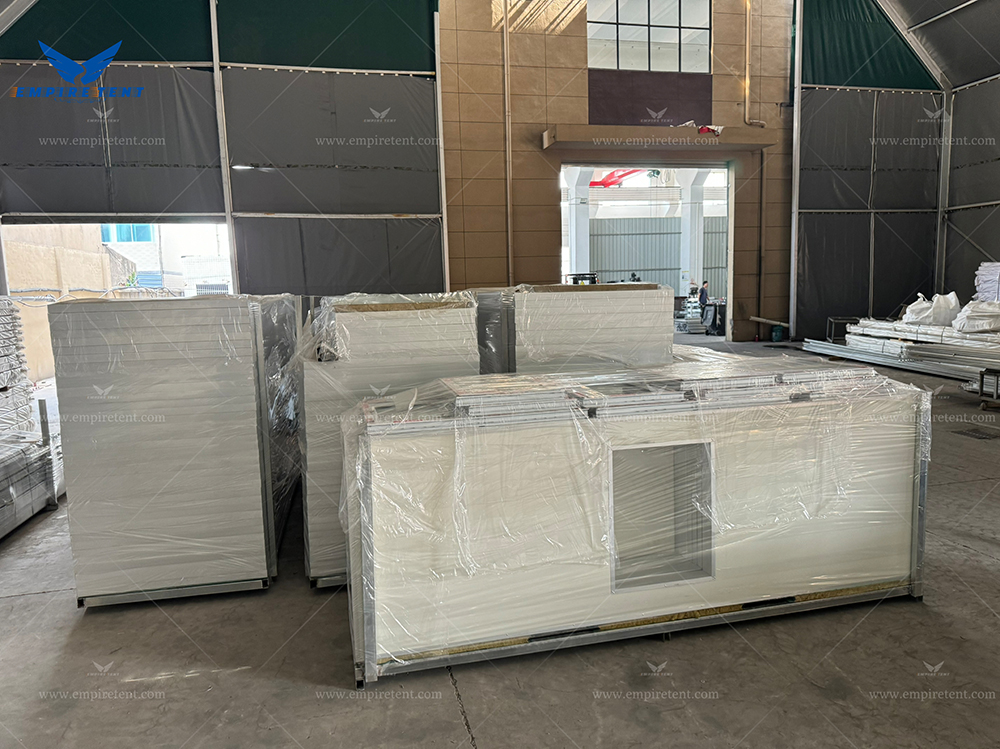 a large tent 30x35m with insulated roof and sidewalls in 3 containers for shipment to UK