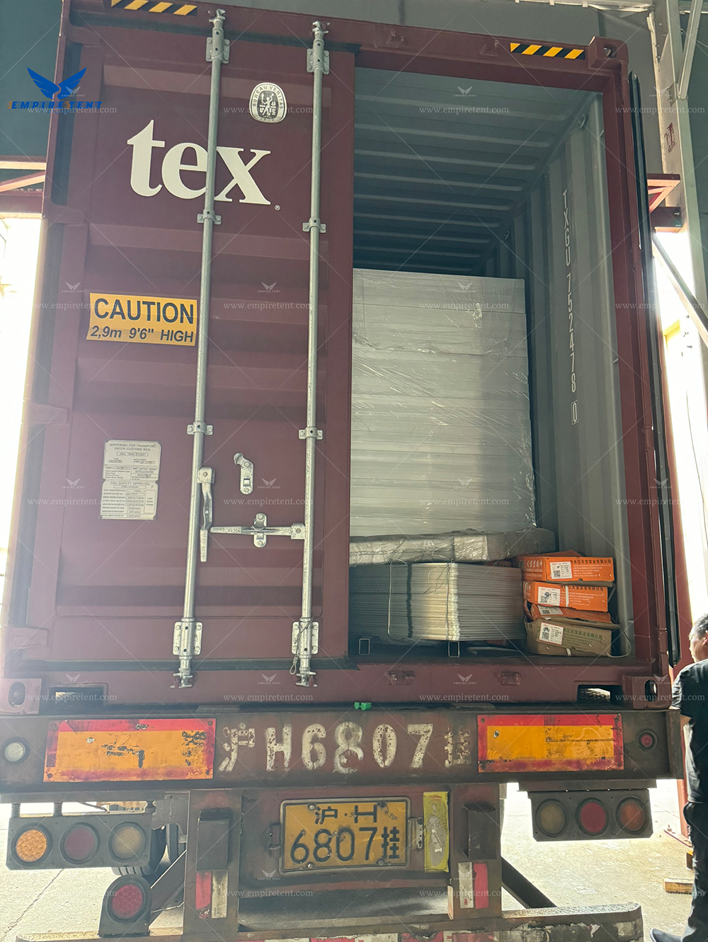 a large tent 30x35m with insulated roof and sidewalls in 3 containers for shipment to UK