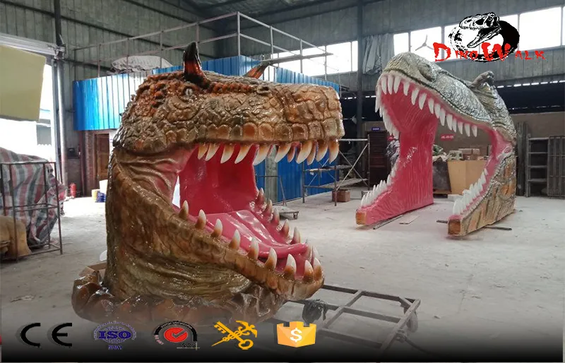 Parque de atracciones con cabeza de dinosaurio gigante de fibra de vidrio