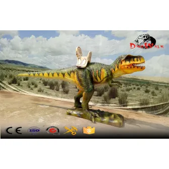 Paseos en dinosaurios animatrónicos con máquina que funciona con monedas.