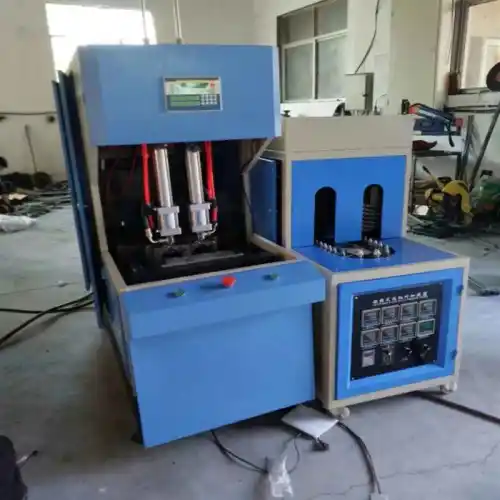 Semi auto two cavity PET bottle blowing machine