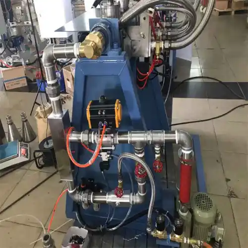 Dual head fire extinguisher inner coating machine