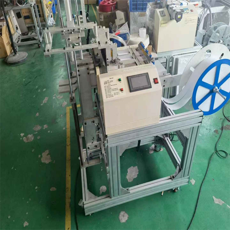 Automatic velcro tape cutting stacking machine