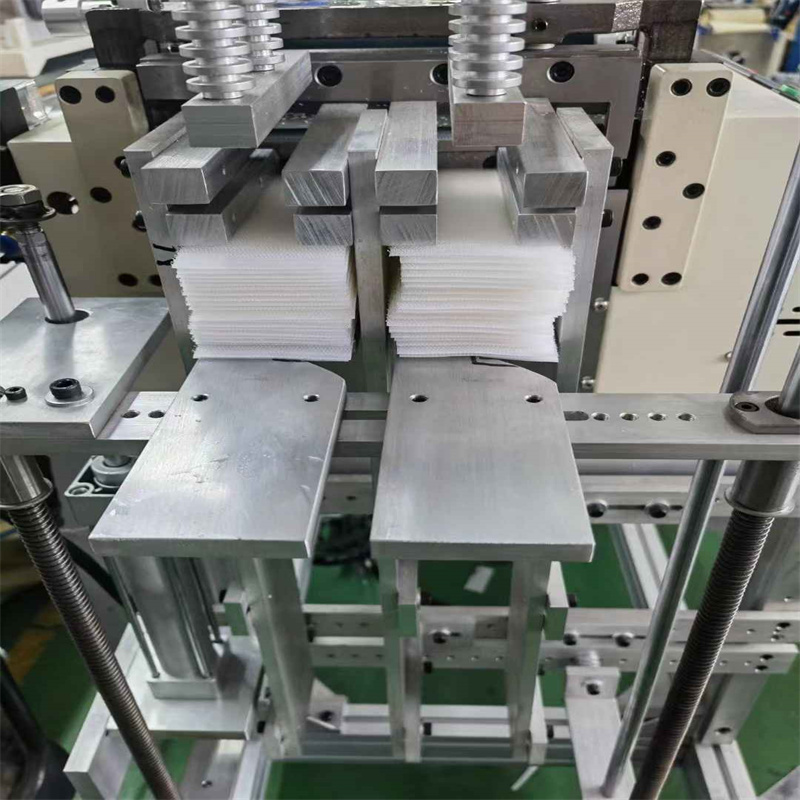 Automatic velcro tape cutting stacking machine